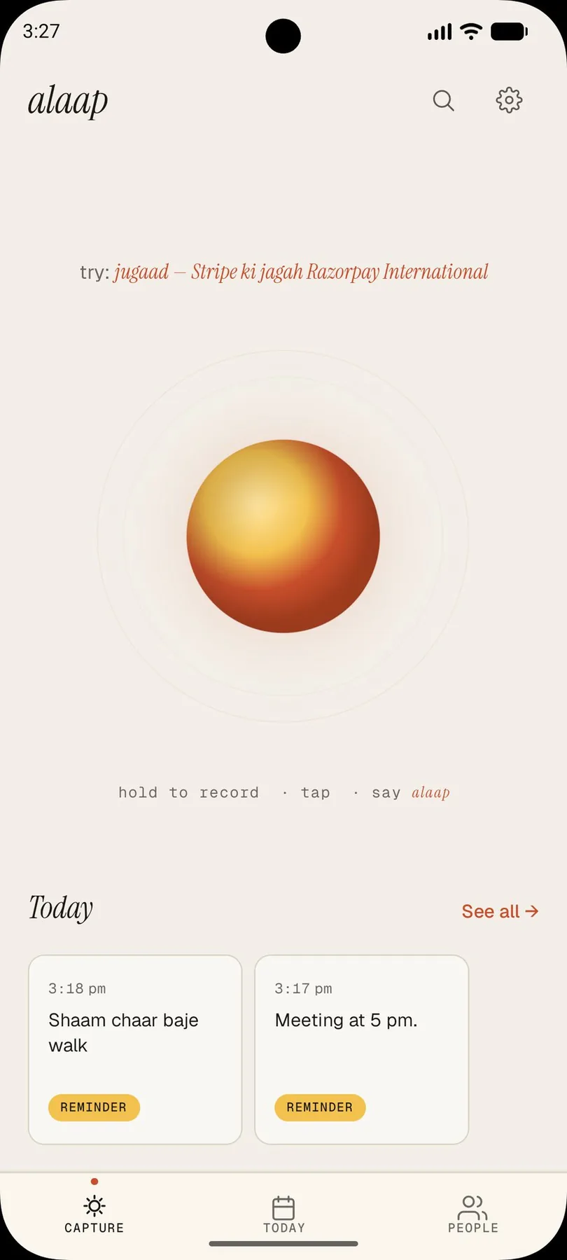Alaap capture screen with a record orb and the hint to hold to record and say alaap.